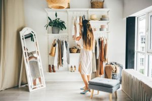 Lady in front of her wardrobe