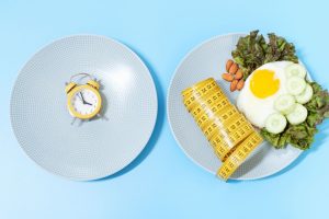 Plates with a clock and food